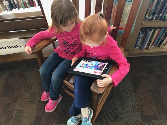 Students in rocking chair